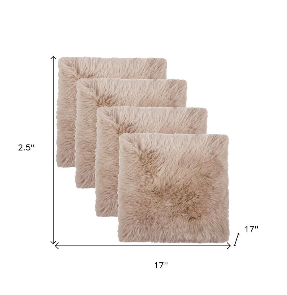 Set Of Four 17" X 17" Taupe Wool Chair Pads on a white background