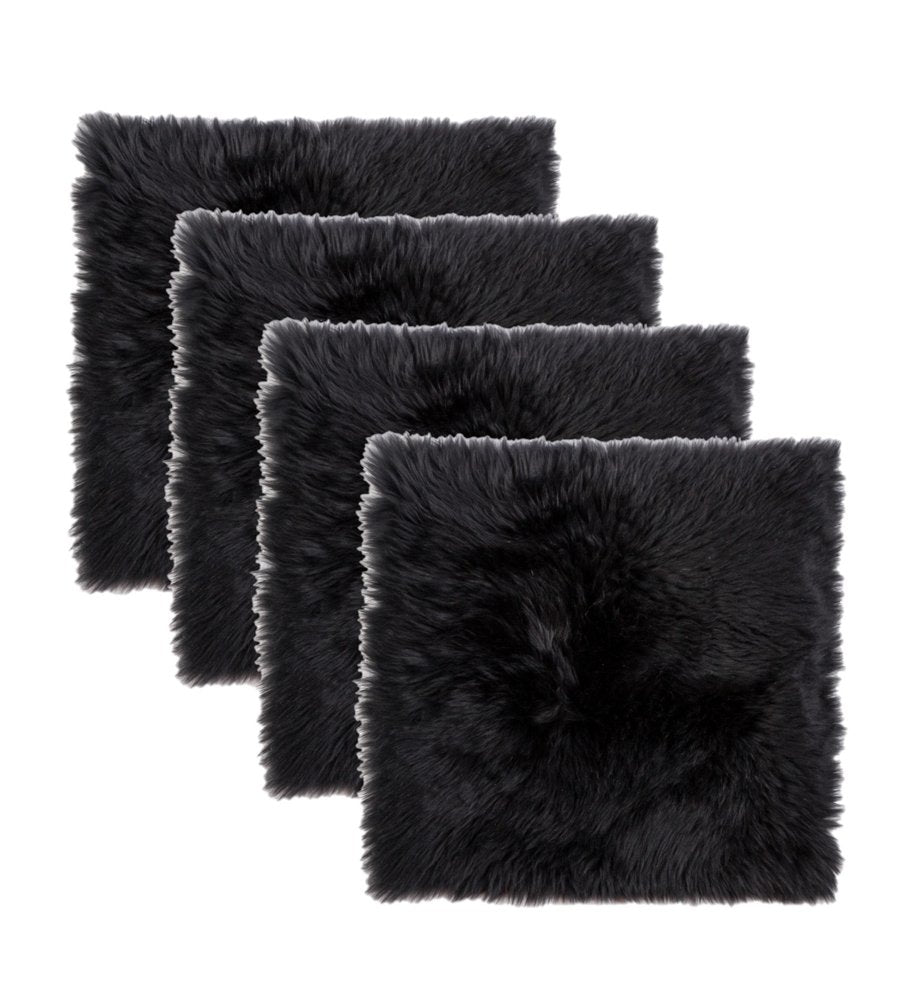 Four black wool chair pads arranged in a staggered pattern on a white background.