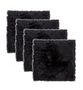 Set Of Four 17" X 17" Black Wool Chair Pads on a white background