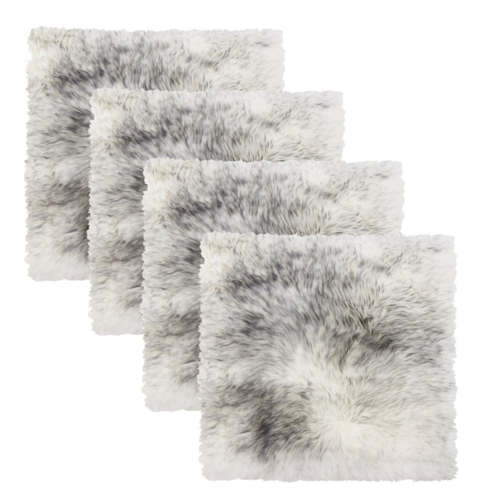 Four gradient grey wool chair pads arranged in a staggered pattern on a white background.