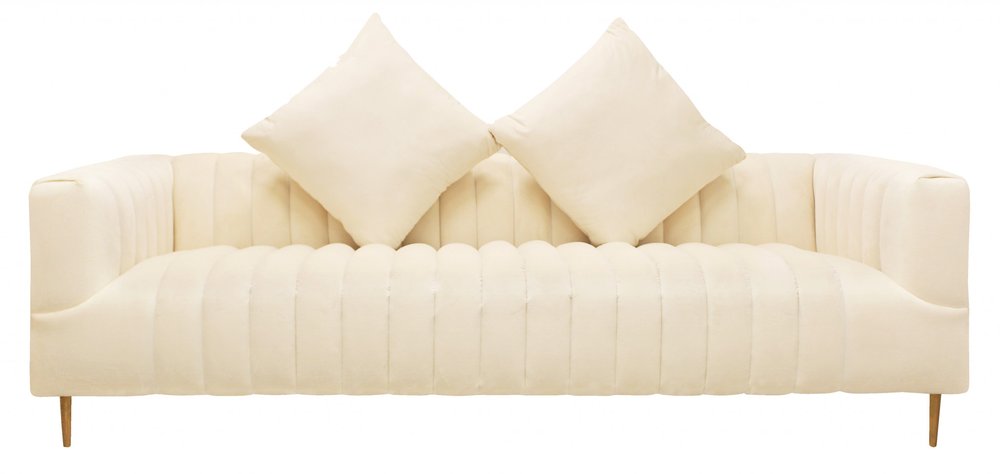 90" Ivory Velvet Sofa And Toss Pillows With Gold Legs on a white background