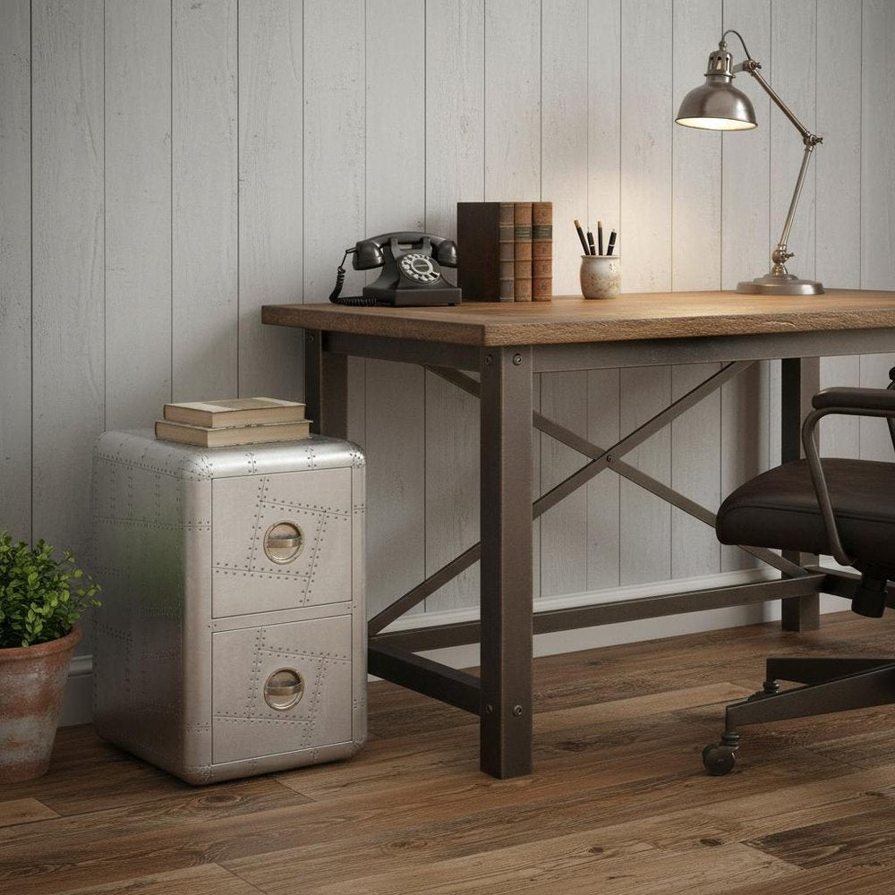 32" Silver Aviator Aluminum Two Drawer Filing Cabinet styled in a furnished interior with a light gray wall on a dark wood floor.
