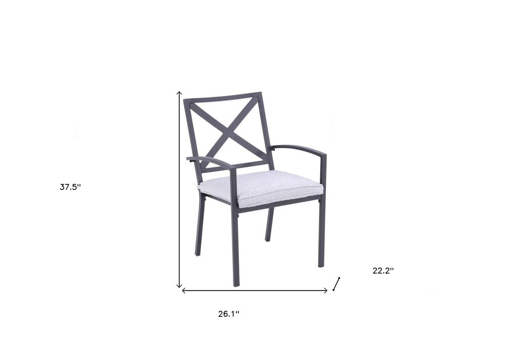Set of Two Dark Gray Aluminum Outdoor Stacking Dining Chairs with Light Gray Cushion on a white background