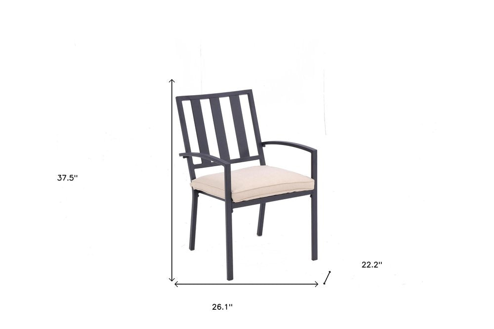 Set of Two Dark Gray Aluminum Outdoor Stacking Dining Chairs with Beige Cushion on a white background