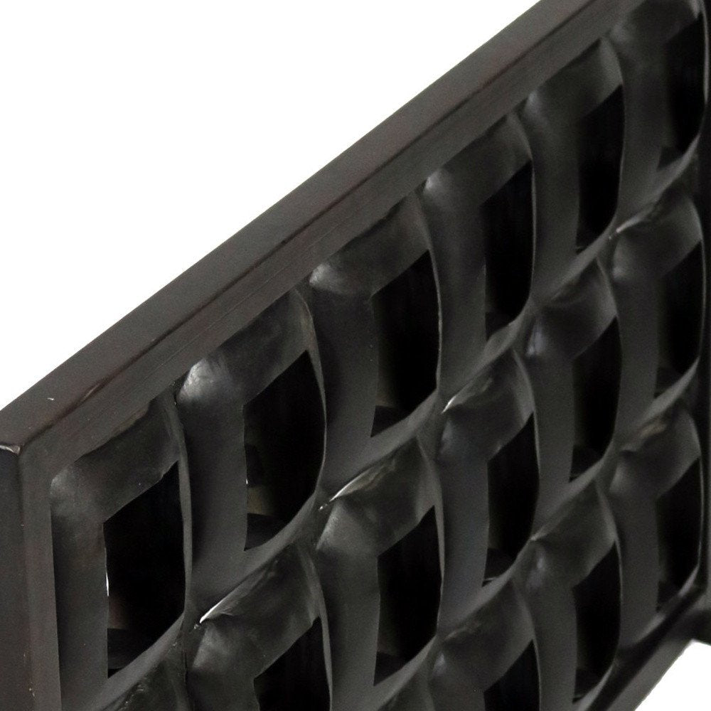 23" Black Iron Geometric Floor Tealight Candle Holder photographed against a dark studio background in black.