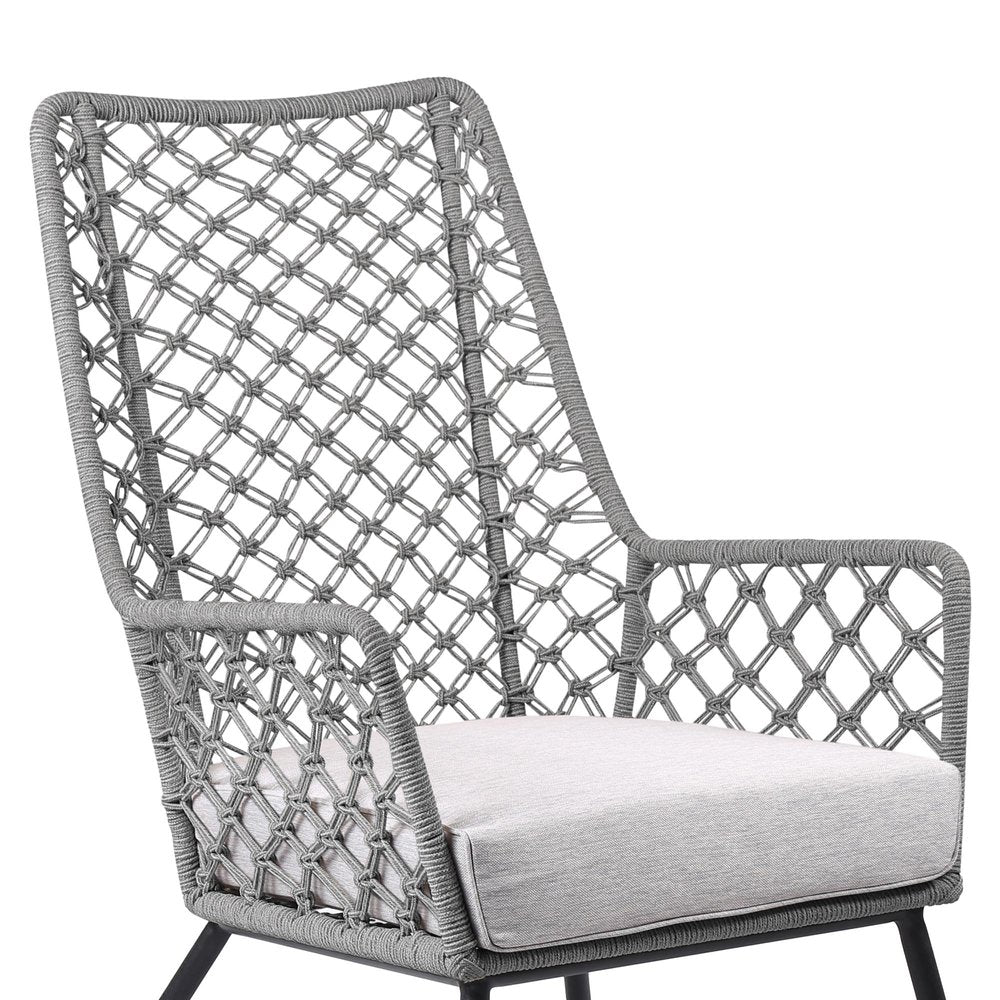 26" Gray and Black Steel Indoor Outdoor Dining Chair with Gray Cushion. Outdoor chair isolated on a plain white background, finished in gray metal.