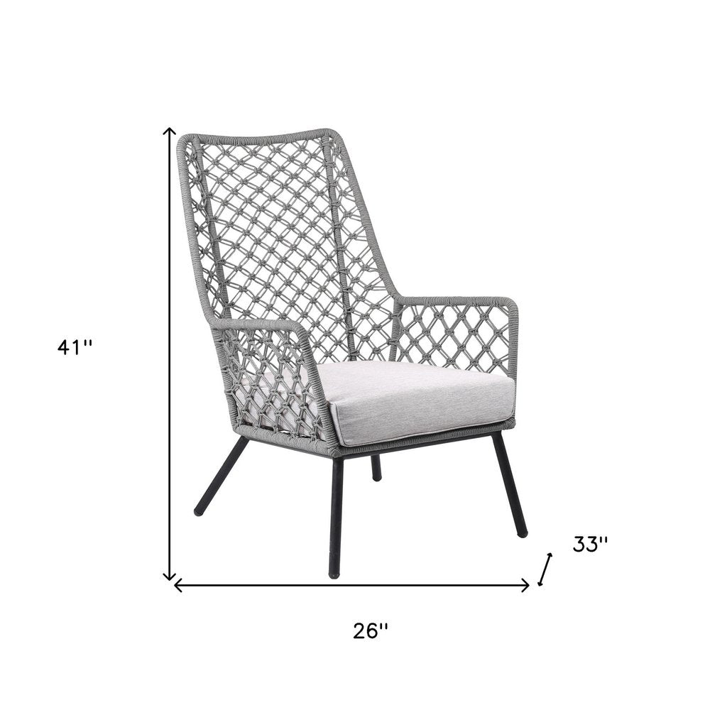 26" Gray and Black Steel Indoor Outdoor Dining Chair with Gray Cushion. Outdoor chair isolated on a plain white background, finished in gray metal.