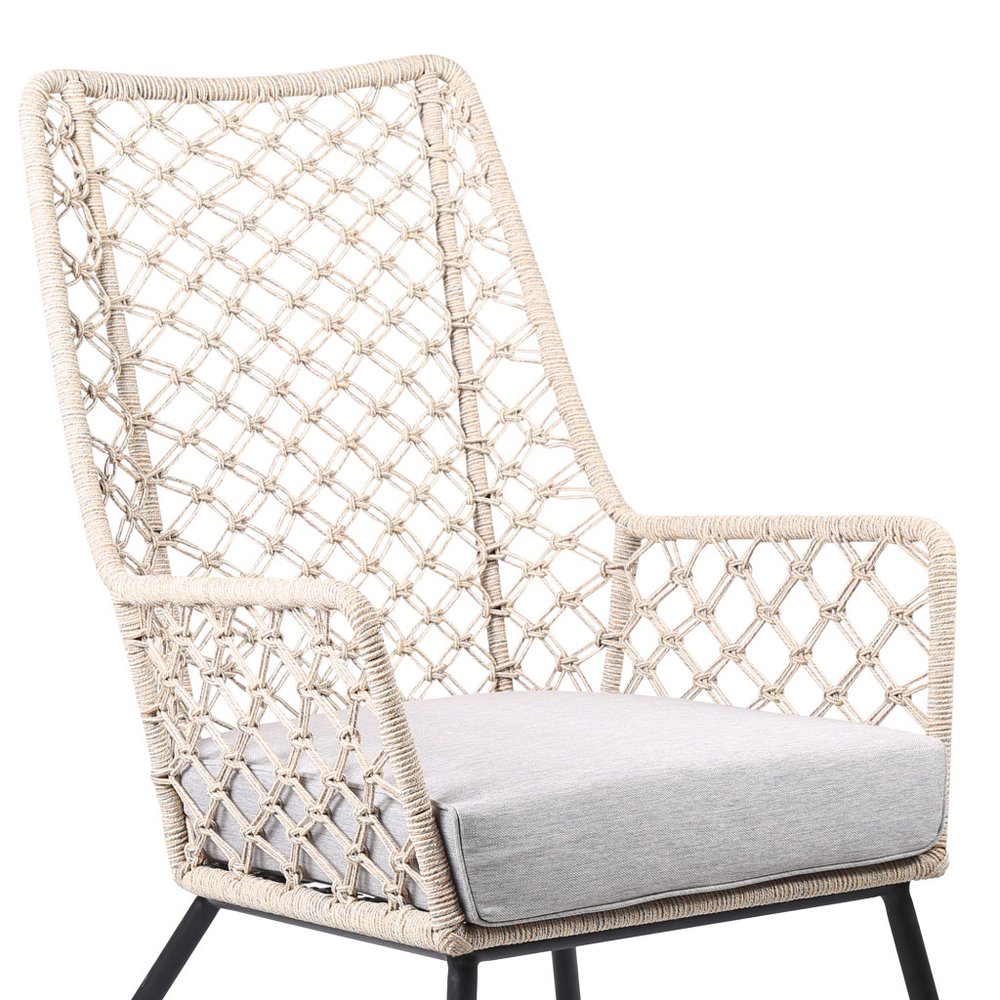 26" Gray Metal Outdoor Dining Chair with Gray Cushion. Outdoor chair isolated on a plain white background, finished in beige metal.