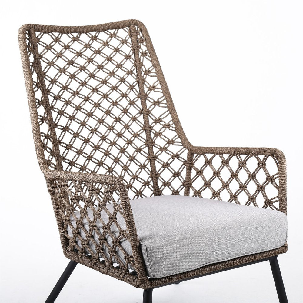 26" Gray Metal Outdoor Arm Chair with Gray Cushion. Outdoor chair isolated on a plain white background, showing a taupe metal surface.