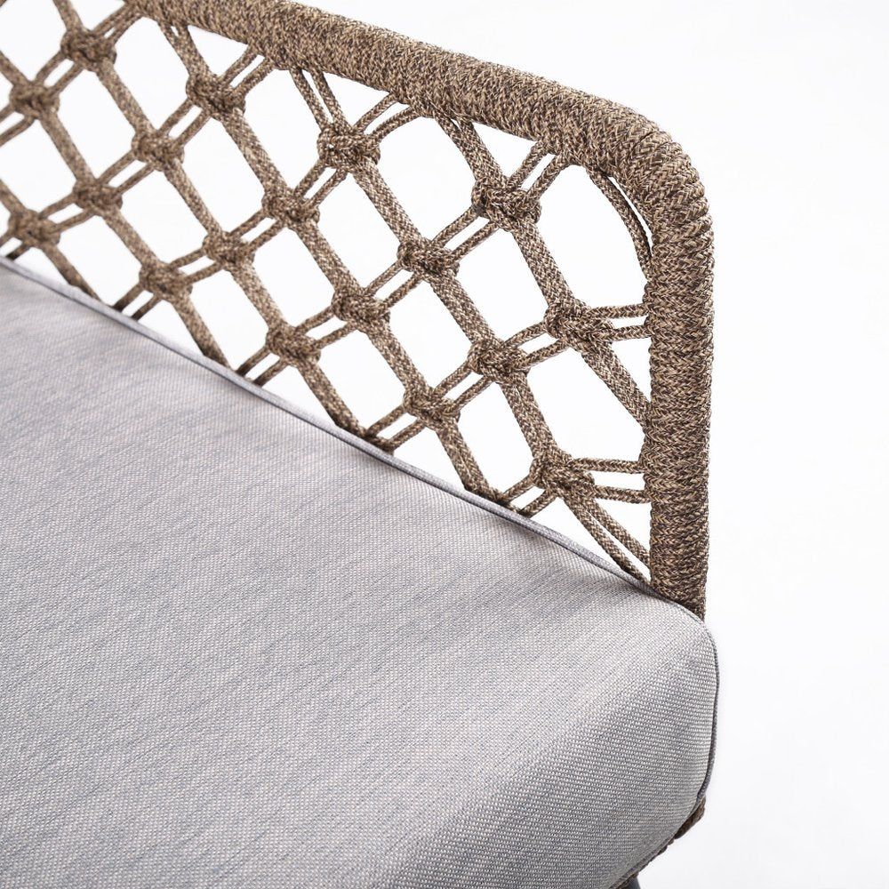 26" Gray Metal Outdoor Arm Chair with Gray Cushion. Outdoor chair isolated on a plain white background, in a taupe metal finish.