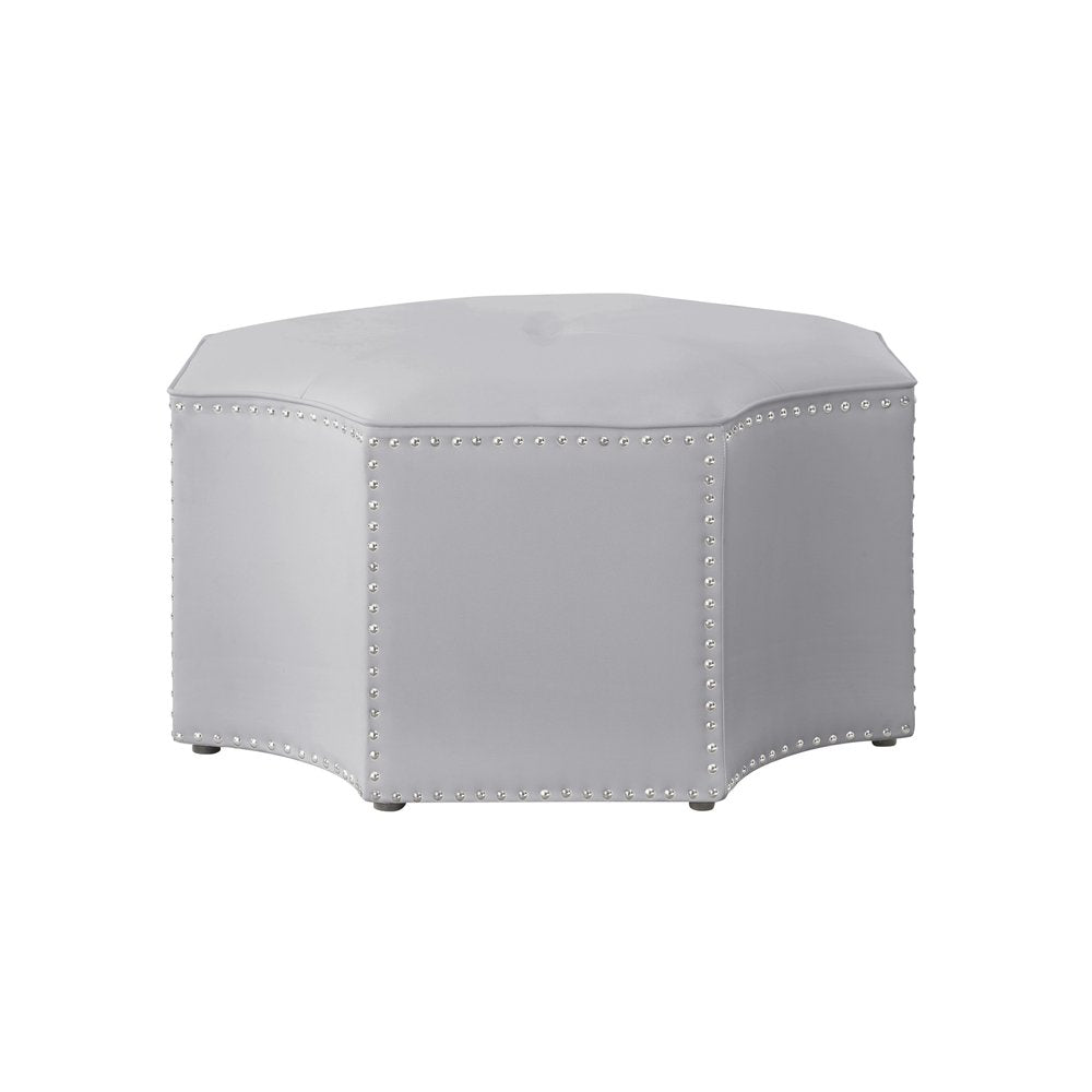 Silver octagonal faux leather ottoman with nailhead trim on a white background.