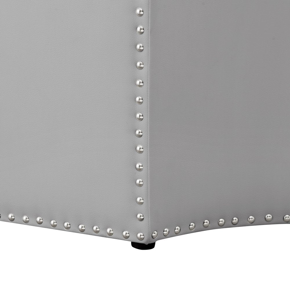 33" Silver Faux Leather Tufted Octagonal Cocktail Ottoman. Ottoman in silver faux leather.