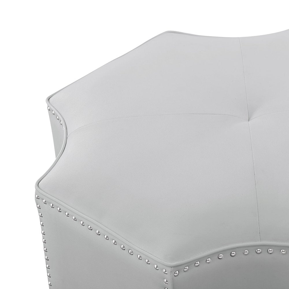 33" Silver Faux Leather Tufted Octagonal Cocktail Ottoman. Ottoman isolated on a plain white background, in a silver faux leather finish.