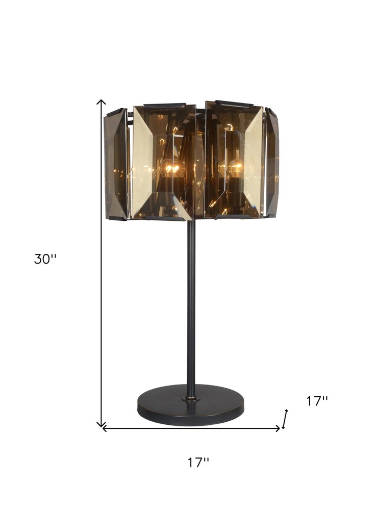 30" Bronze Metal Four Light Cylinder Bedside Table Lamp With Amber Round Shade. Table lamp isolated on a plain white background, showing a metal surface.