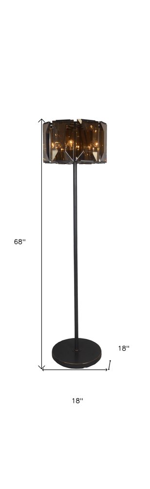 68" Dark Bronze Floor Lamp With Amber Solid Color Beveled Glass Drum Shade. Floor lamp isolated on a plain white background, showing a glass surface.