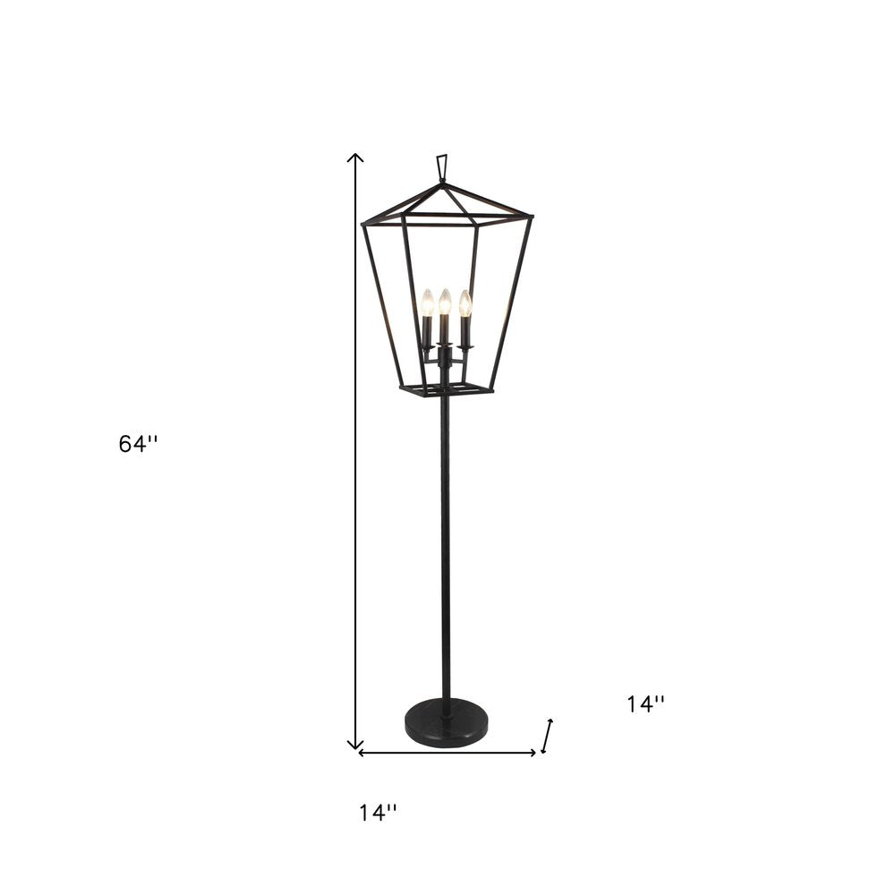 64" Black Three Light Floor Lamp With Black Geometric Shade. Floor lamp isolated on a plain white background, showing a metal surface.