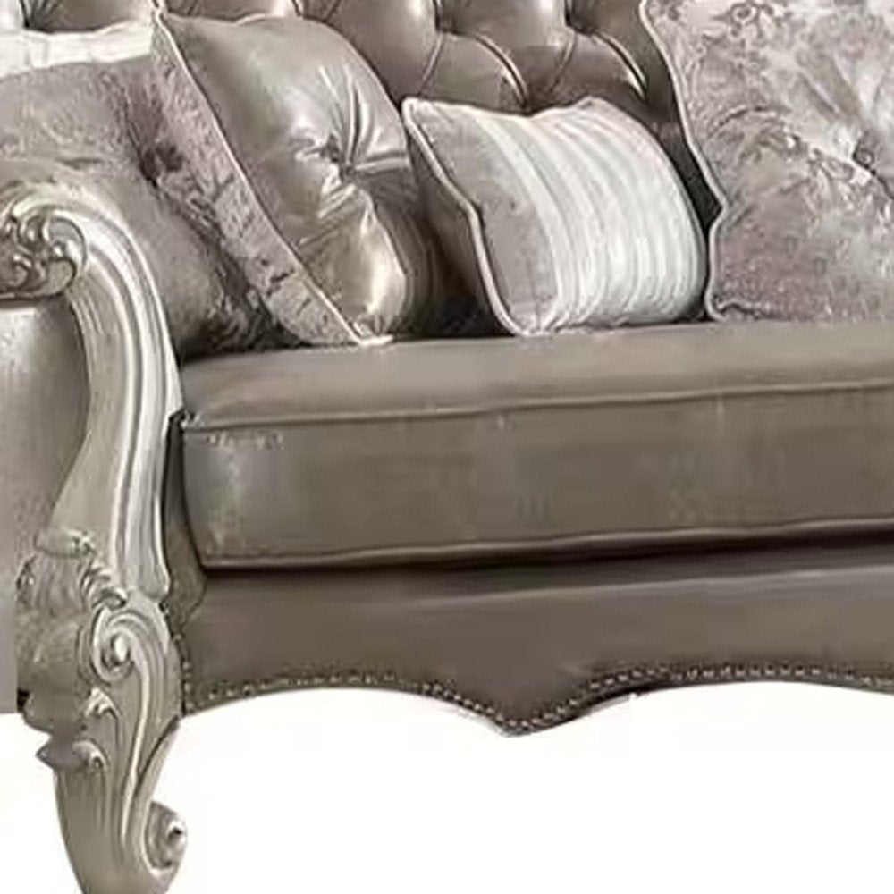 90" Gray Faux Leather Curved Sofa And Toss Pillows With Bone Legs on a white background