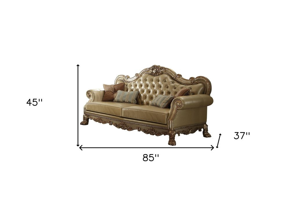 85" Bone Faux Leather Wood Sofa With Toss Pillows on a white background