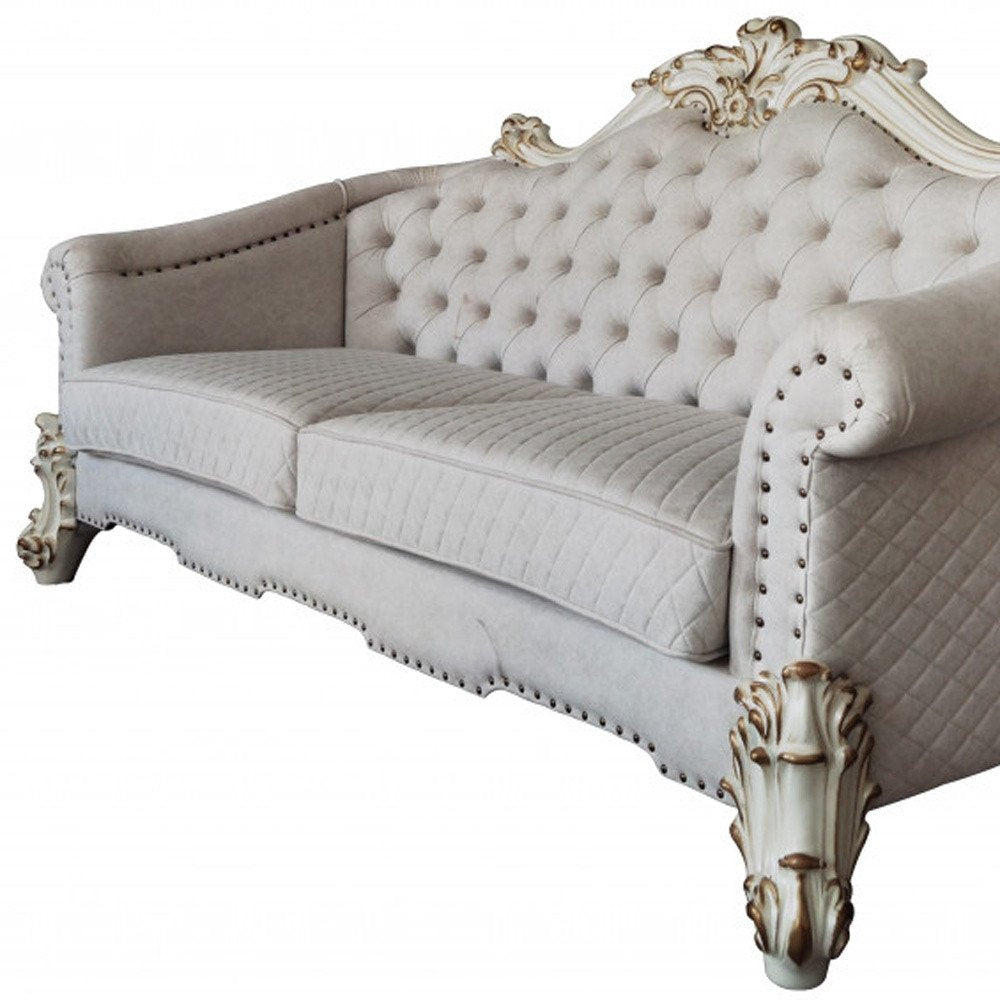89" Ivory Velvet Sofa And Toss Pillows With Pearl Legs on a white background