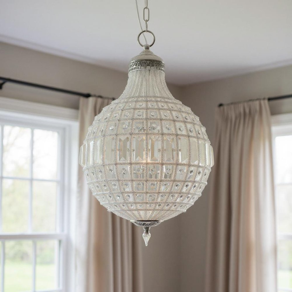 Silver Unique Statement Metal and Crystal Glass Chandelier With Clear Shades on a white background