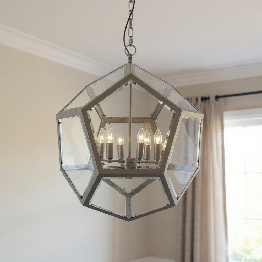 Clear Unique Statement Six Light Metal Chandelier With Clear Shades on a white background
