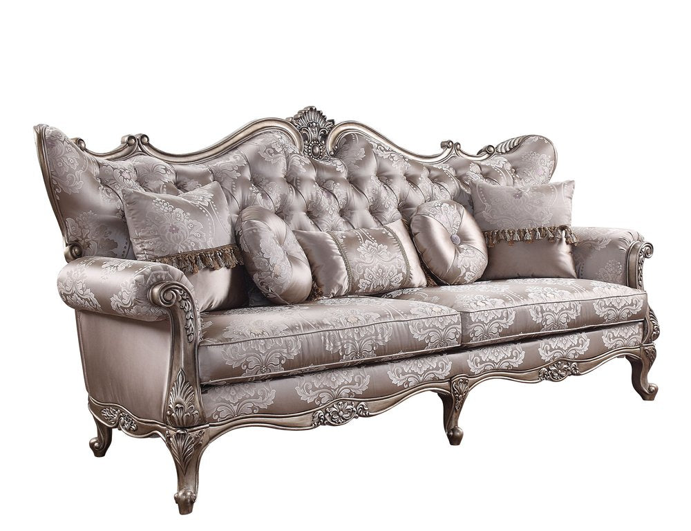 A dark gray imitation silk damask sofa with tufted back and ornate champagne legs, featuring decorative toss pillows, on a white background.
