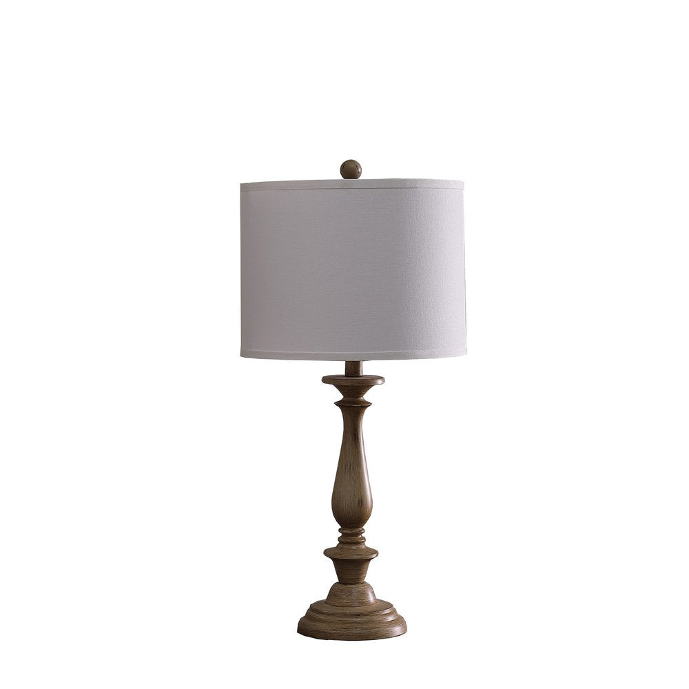 28" Rustic Taupe Cream Candlestick Table Lamp With White Shade. Table lamp isolated on a plain white background, finished in cream.