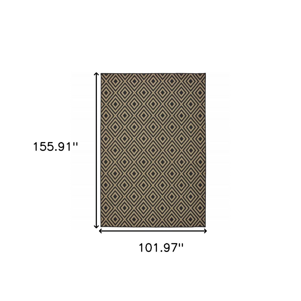 9' X 13' Black and Tan Geometric Stain Resistant Indoor Outdoor Area Rug on a white background