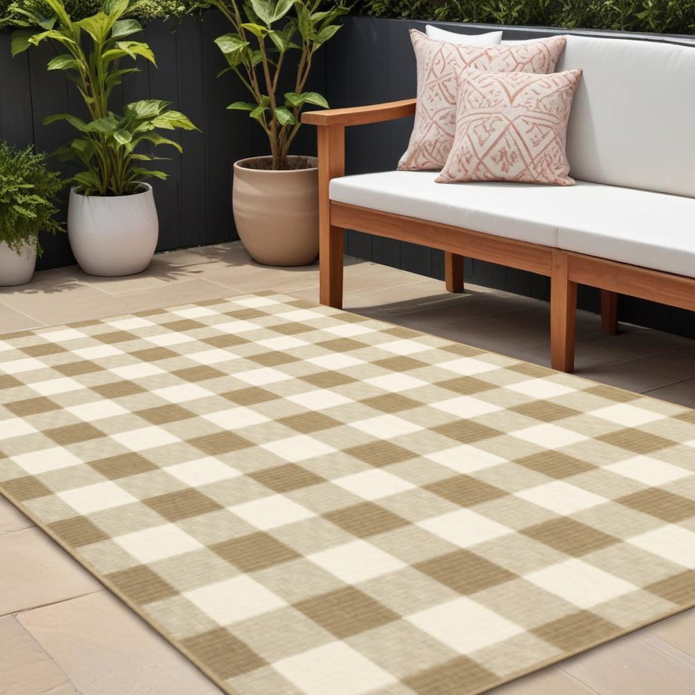 9' X 13' Gray and Ivory Geometric Stain Resistant Indoor Outdoor Area Rug in a home interior