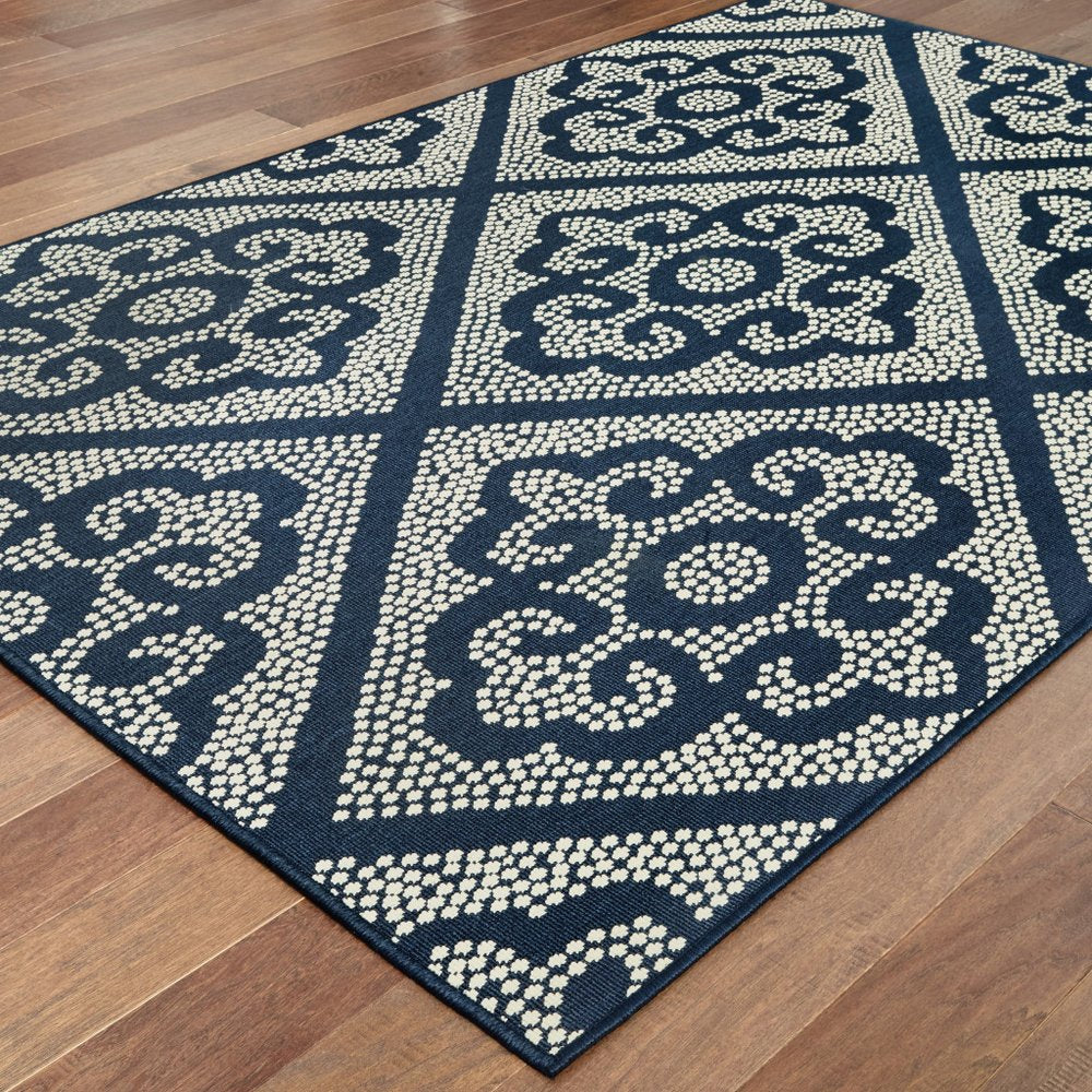 9' X 13' Blue and Ivory Geometric Stain Resistant Indoor Outdoor Area Rug - SKU 507029