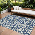 9' X 13' Blue and Ivory Geometric Stain Resistant Indoor Outdoor Area Rug