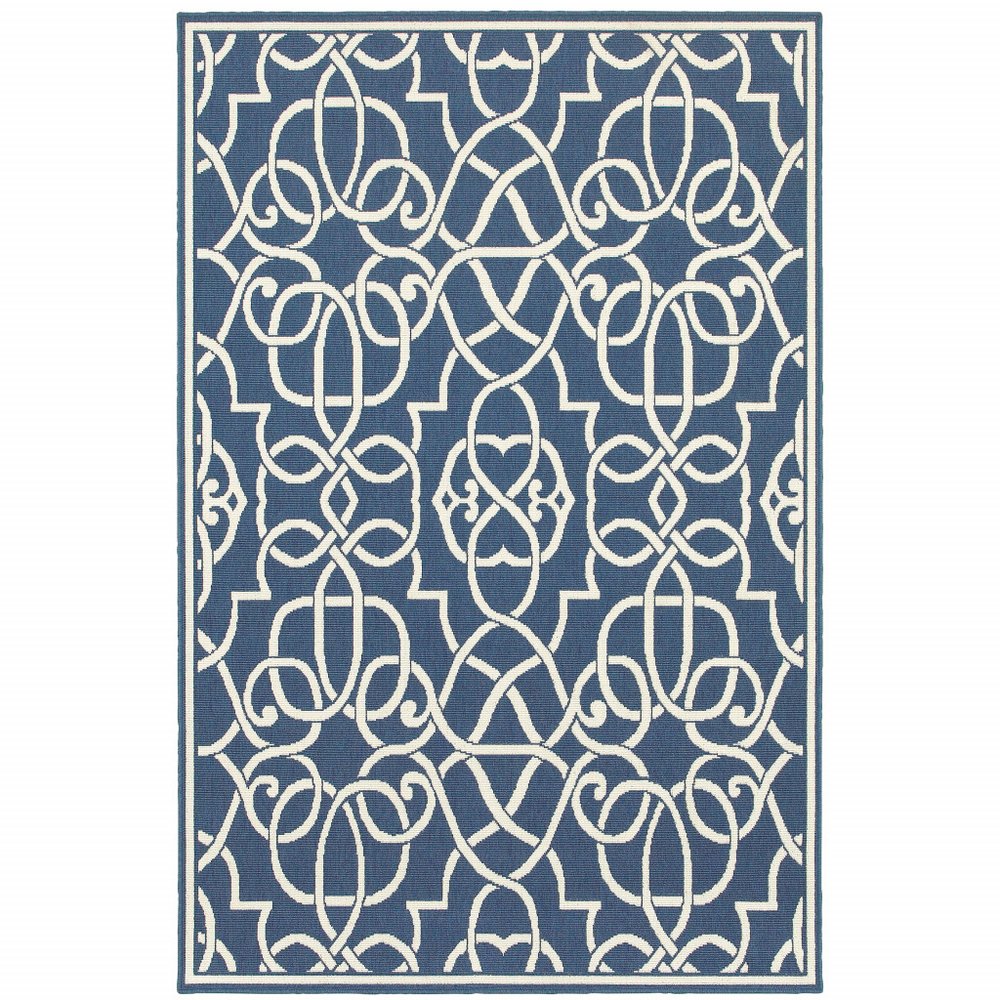 Blue and ivory geometric indoor/outdoor area rug with a white border on a white background.