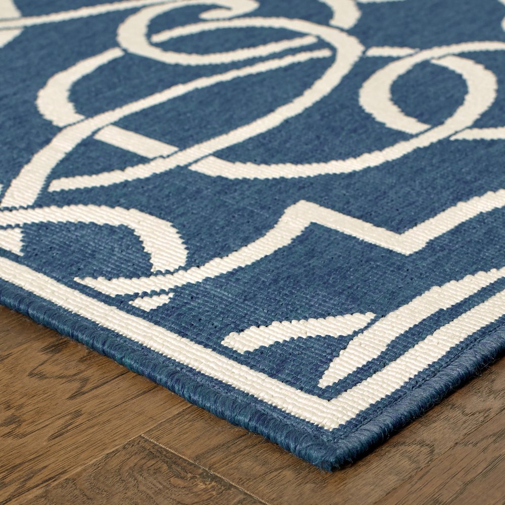 9' X 13' Blue and Ivory Geometric Stain Resistant Indoor Outdoor Area Rug - SKU 507107