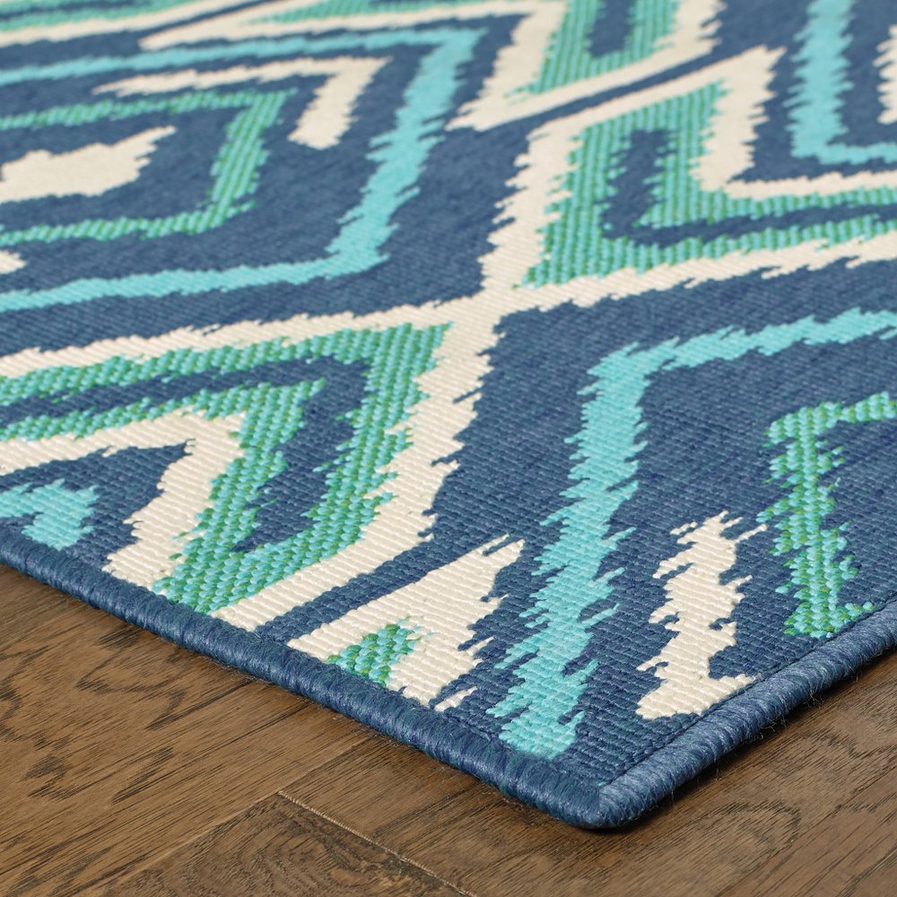 9' X 13' Blue and Ivory Geometric Stain Resistant Indoor Outdoor Area Rug - SKU 507115