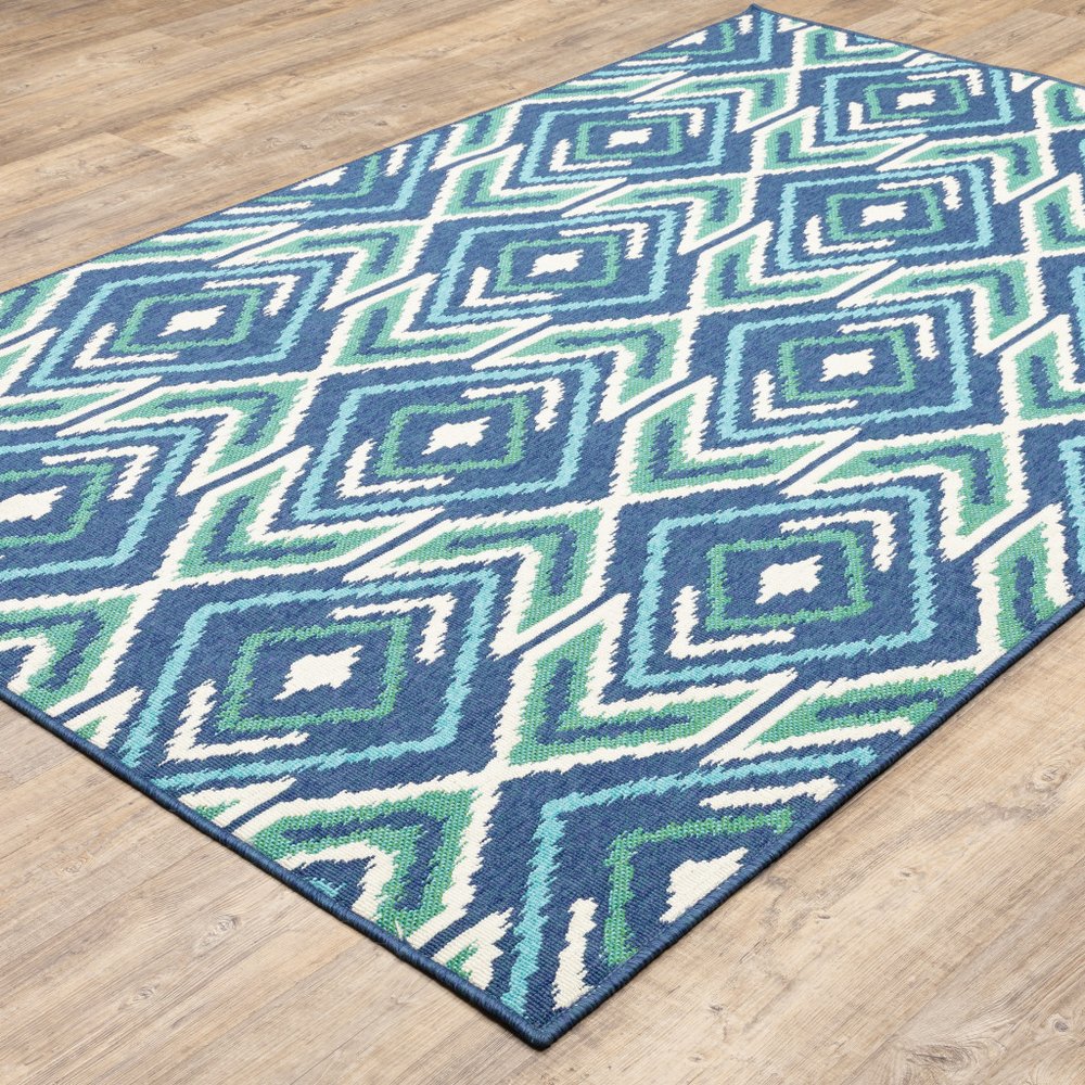 9' X 13' Blue and Ivory Geometric Stain Resistant Indoor Outdoor Area Rug - SKU 507115