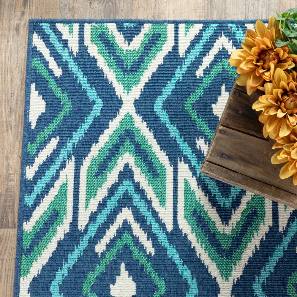 9' X 13' Blue and Ivory Geometric Stain Resistant Indoor Outdoor Area Rug - SKU 507115
