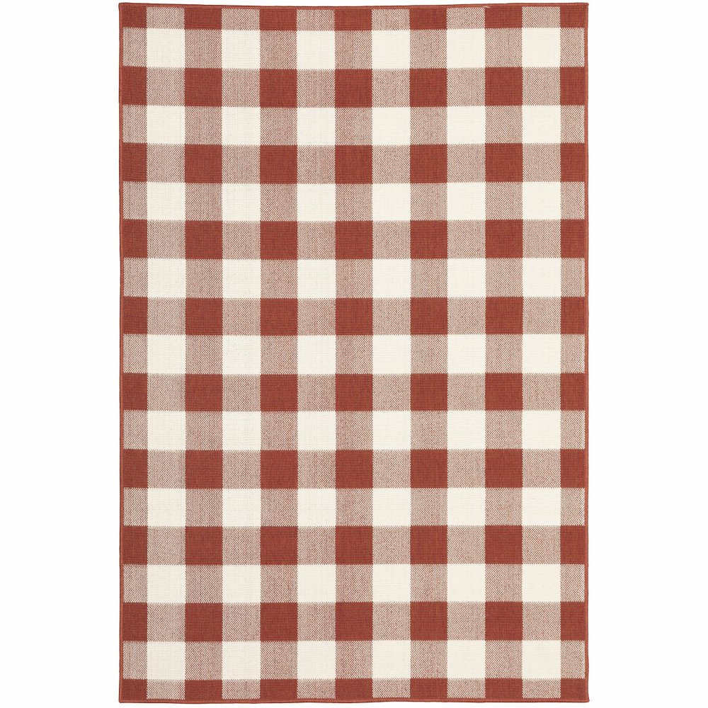 Red and ivory buffalo check indoor outdoor area rug on a white background.