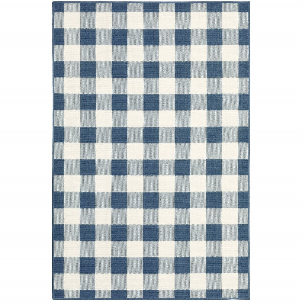A blue and ivory buffalo check area rug on a white background.