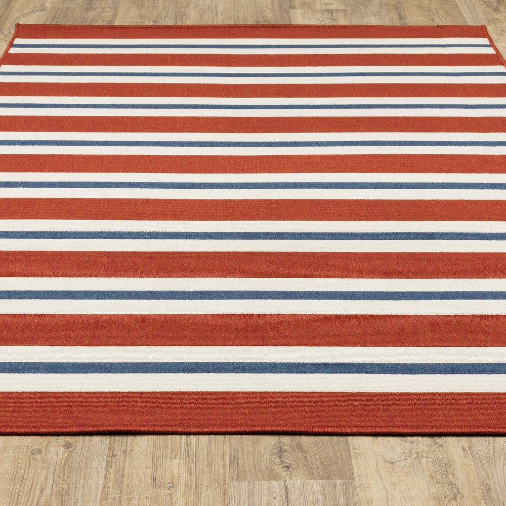 9' X 13' Red and Ivory Geometric Stain Resistant Indoor Outdoor Area Rug