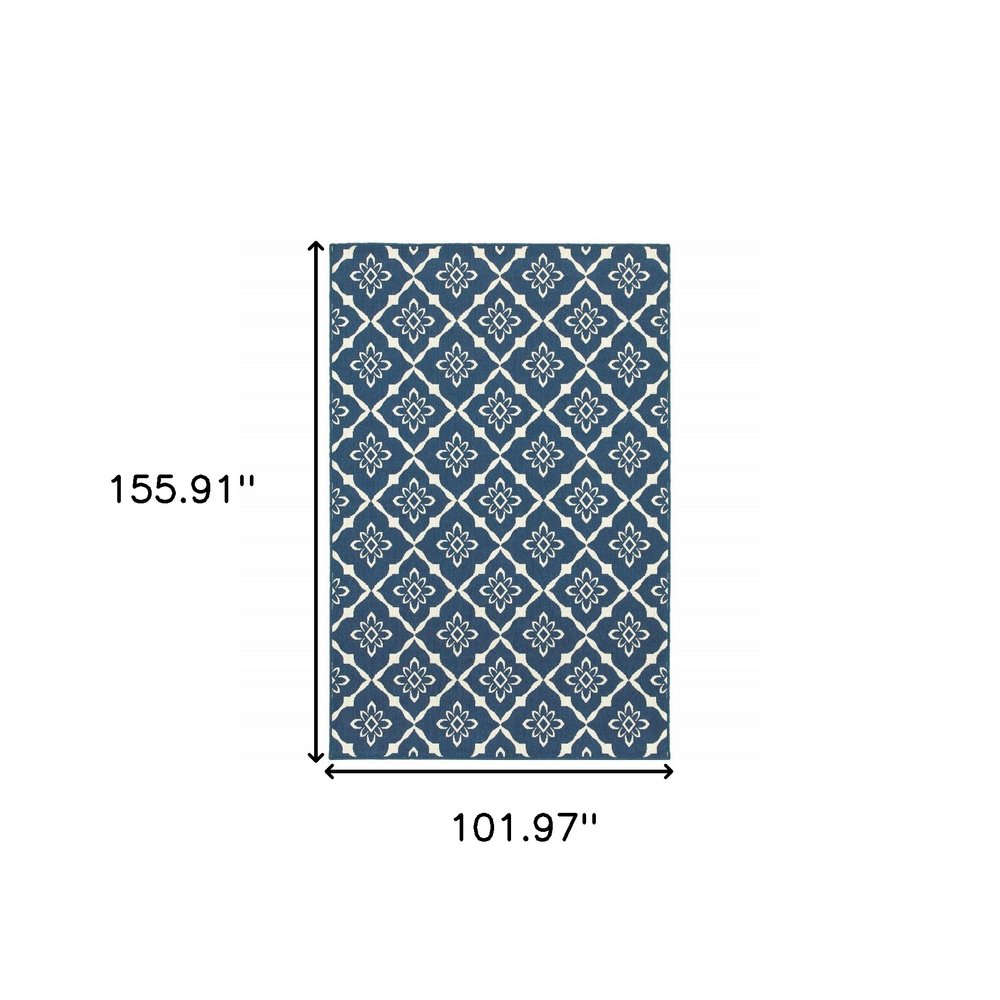 9' X 13' Blue and Ivory Floral Stain Resistant Indoor Outdoor Area Rug on a white background