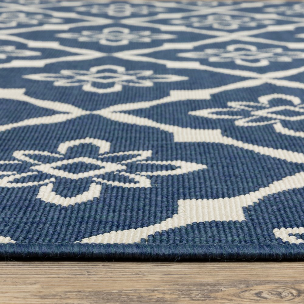 9' X 13' Blue and Ivory Floral Stain Resistant Indoor Outdoor Area Rug - SKU 507163