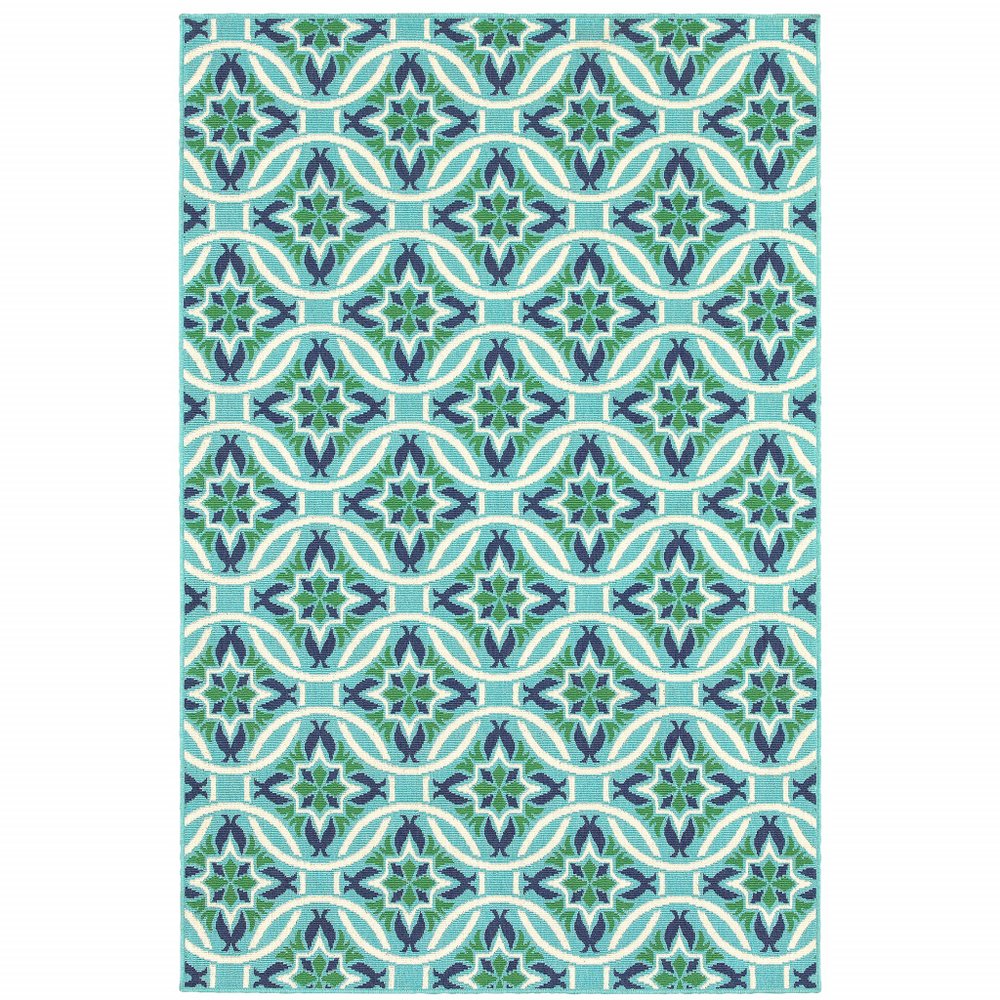 Blue and green geometric indoor outdoor area rug with white and navy accents.