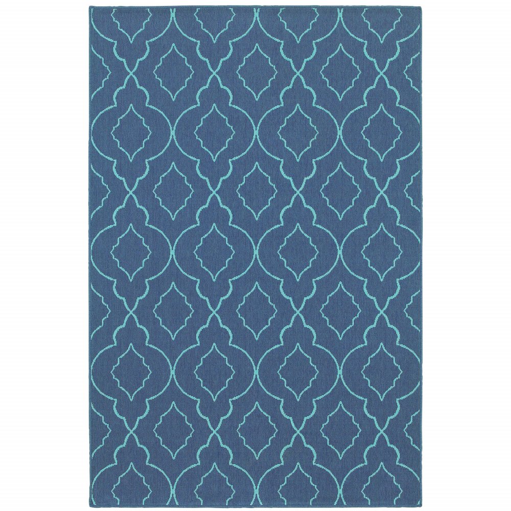 A blue and teal geometric indoor/outdoor area rug with a quatrefoil pattern on a white background.