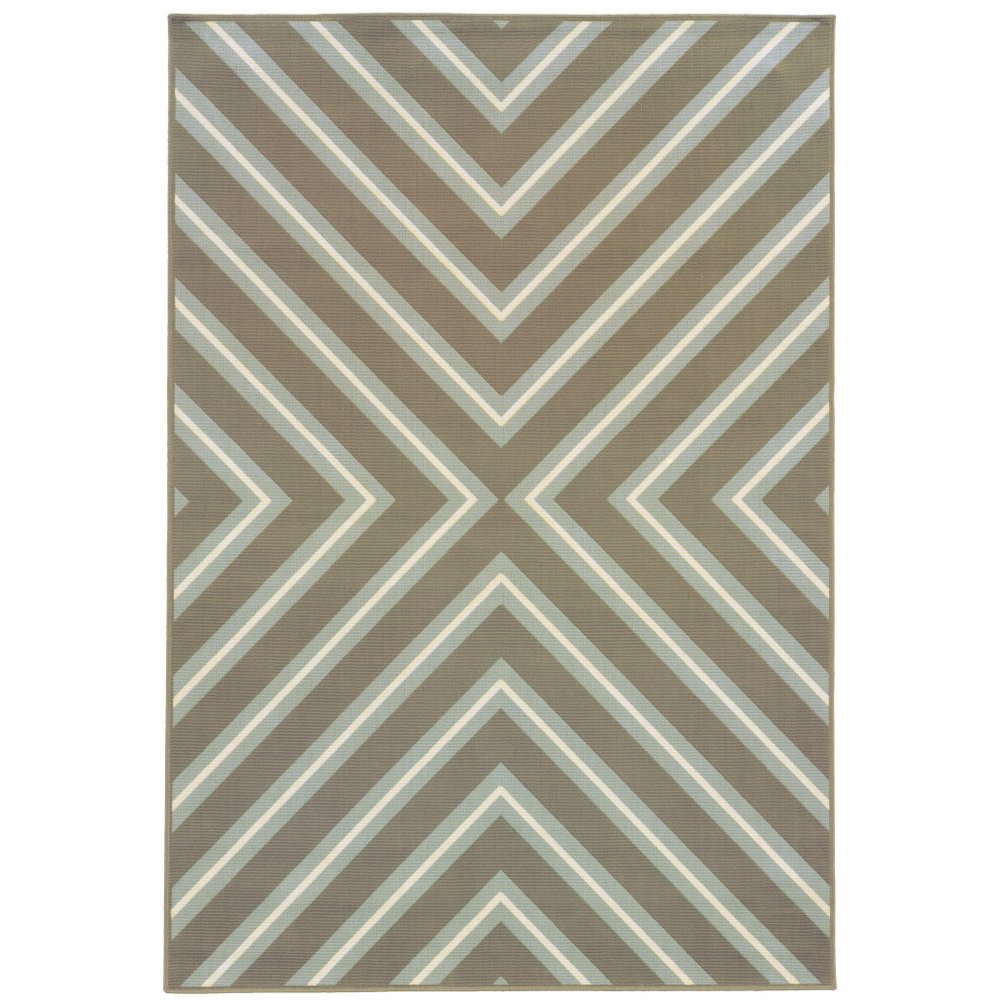A blue and gray geometric indoor/outdoor area rug with a chevron pattern on a white background.