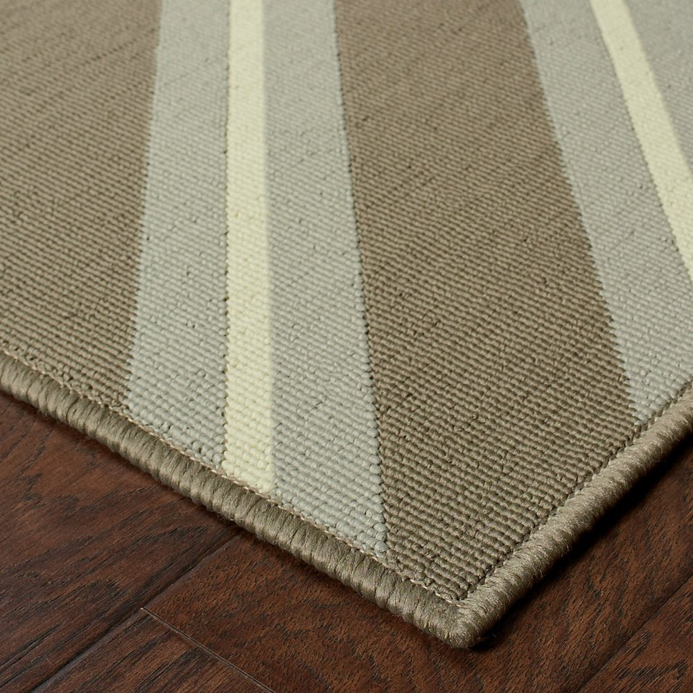 9' X 13' Blue and Gray Geometric Stain Resistant Indoor Outdoor Area Rug in a home interior