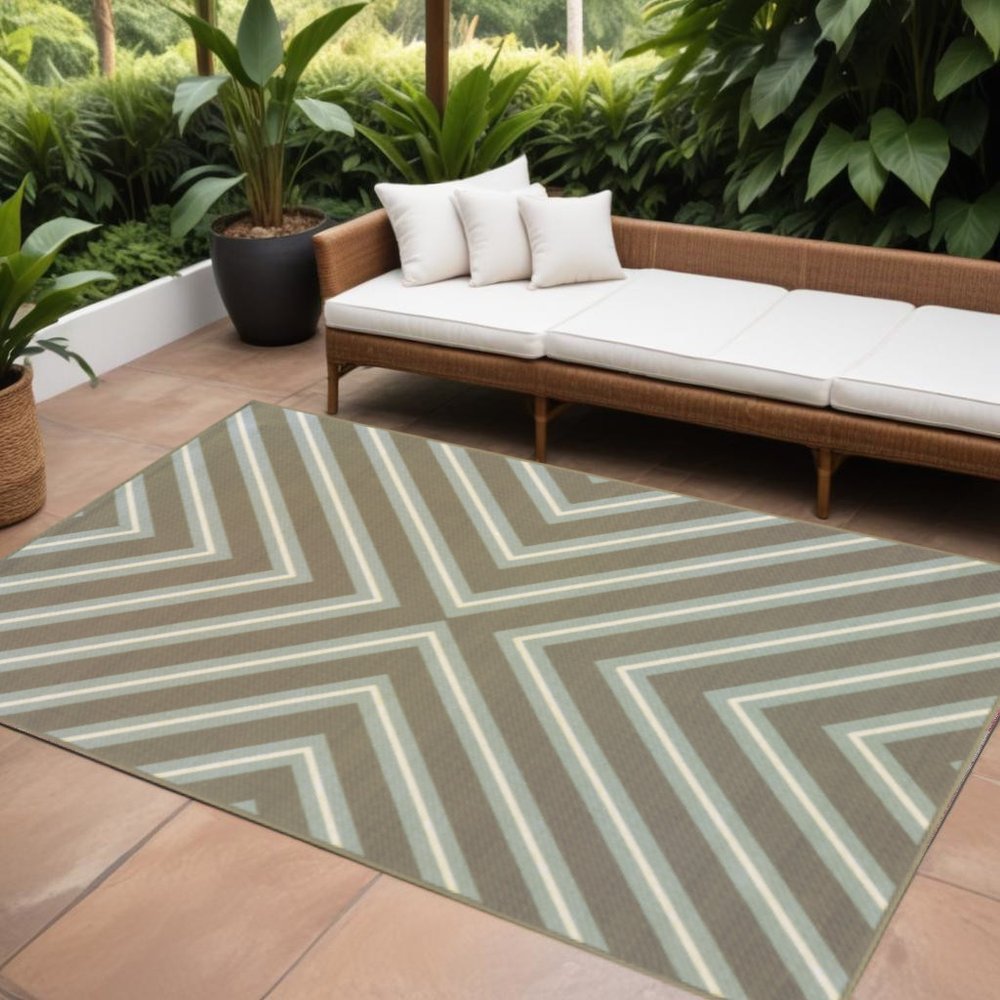 9' X 13' Blue and Gray Geometric Stain Resistant Indoor Outdoor Area Rug in a home interior