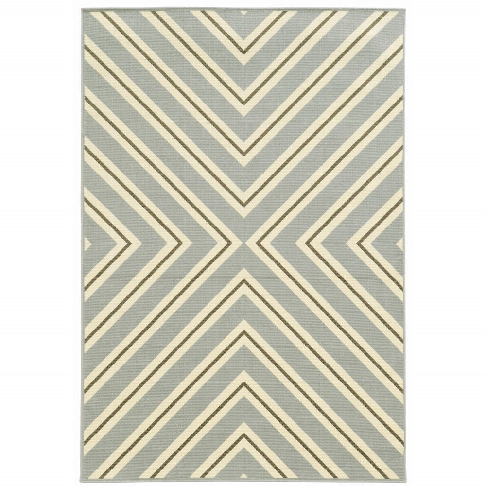 Gray and ivory geometric indoor outdoor area rug with a chevron pattern.