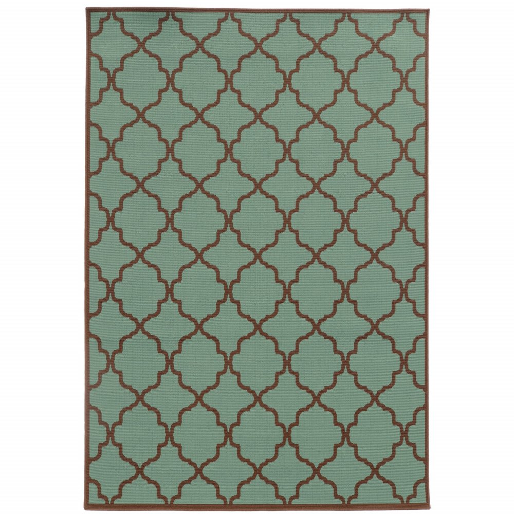 A blue and brown geometric indoor outdoor area rug with a quatrefoil pattern.