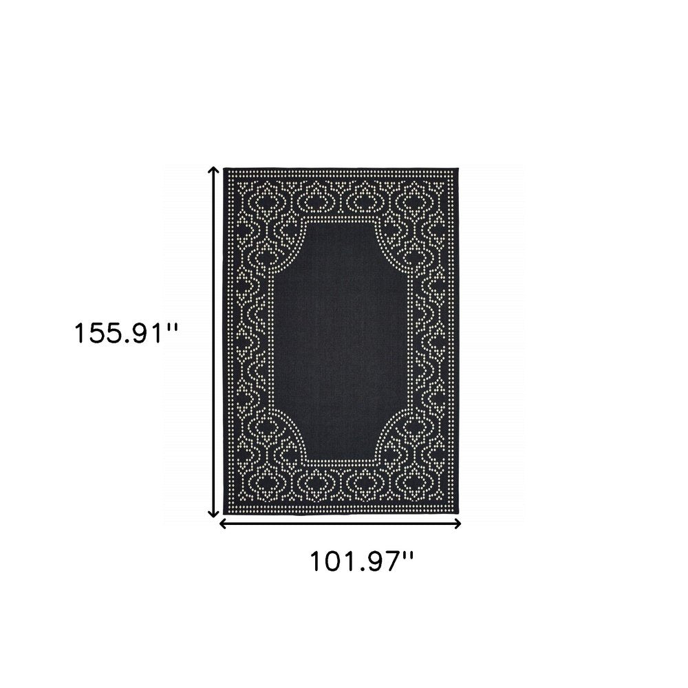 9' X 13' Black and Ivory Stain Resistant Indoor Outdoor Area Rug on a white background