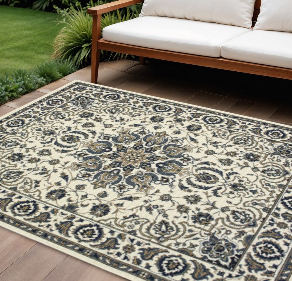 9' X 13' Ivory And Blue Oriental Indoor Outdoor Area Rug in a home interior